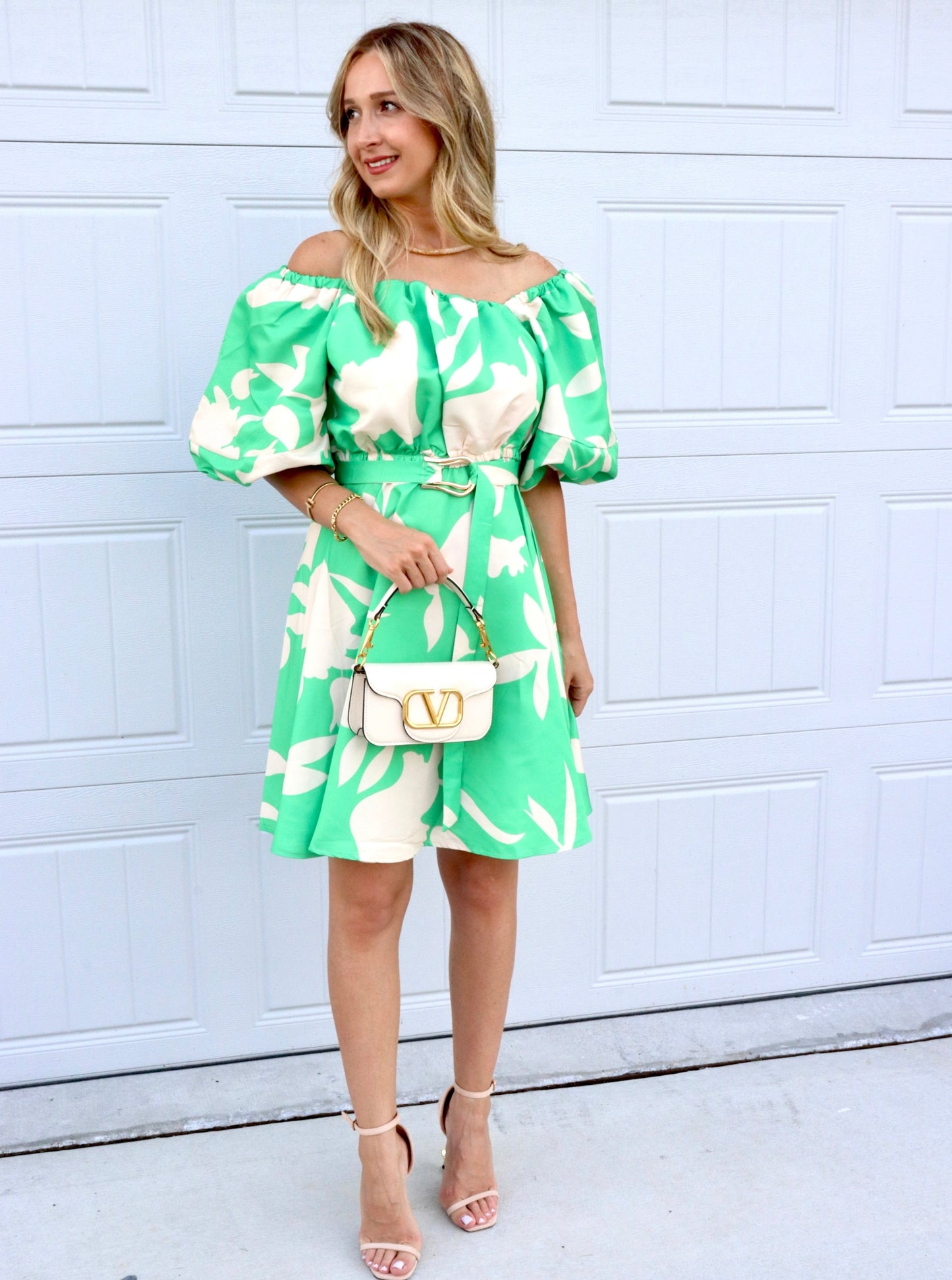 Feminine styling with the Dublin Green One Shoulder Dress! - Elegant elasticated Neckline - Elasticated Waistline - Puffed Sleeve - Includes Belt w/ Belt Loops - True to Size - Material: Polyester
