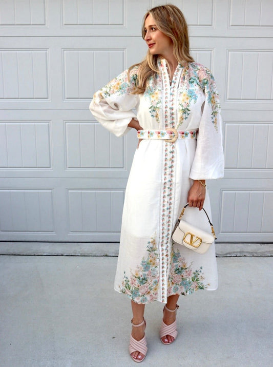 Feminine styling with the Sicily Hijab  floral buttons long sleeve belt Dress!  - Elegant embroidered with enchanting flowers - Detailed intricate lace- V neck with Elastic cuff - Buckle belt included - Cotton Slip included - Material : Linen 70%, Tencel 65%