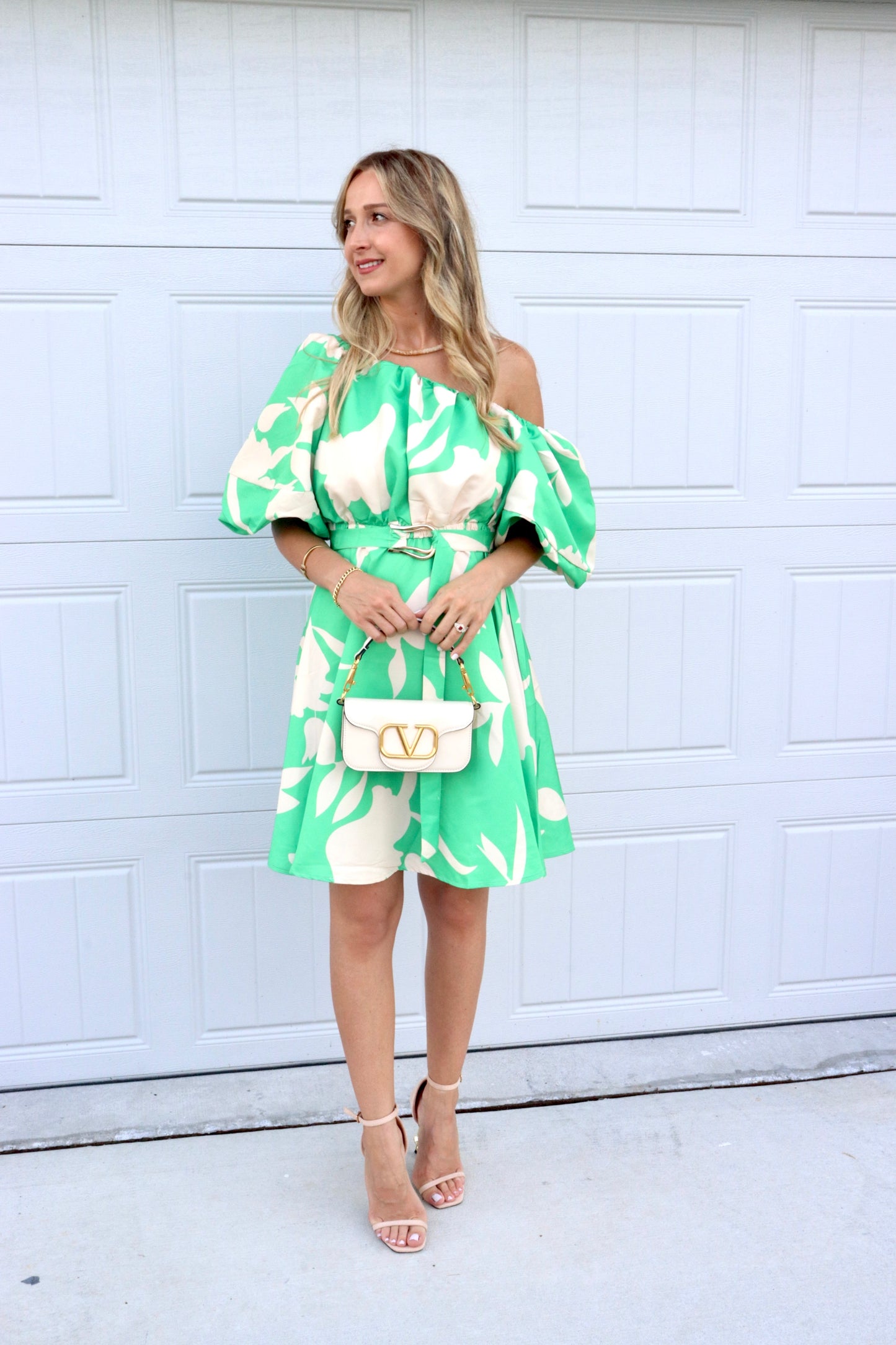 Feminine styling with the Dublin Green One Shoulder Dress! - Elegant elasticated Neckline - Elasticated Waistline - Puffed Sleeve - Includes Belt w/ Belt Loops - True to Size - Material: Polyester