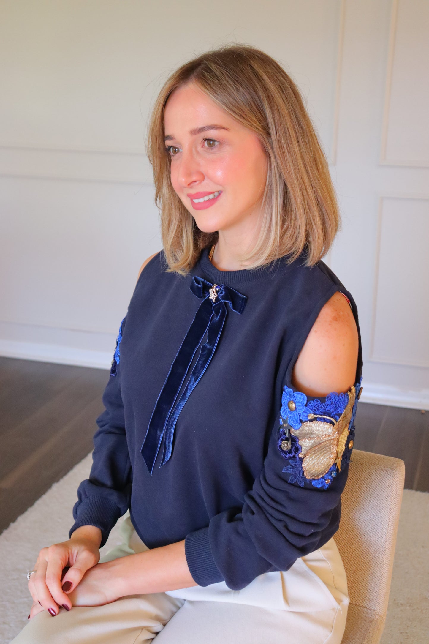 Cold shoulder flower embellished sweater- Velvet Bow