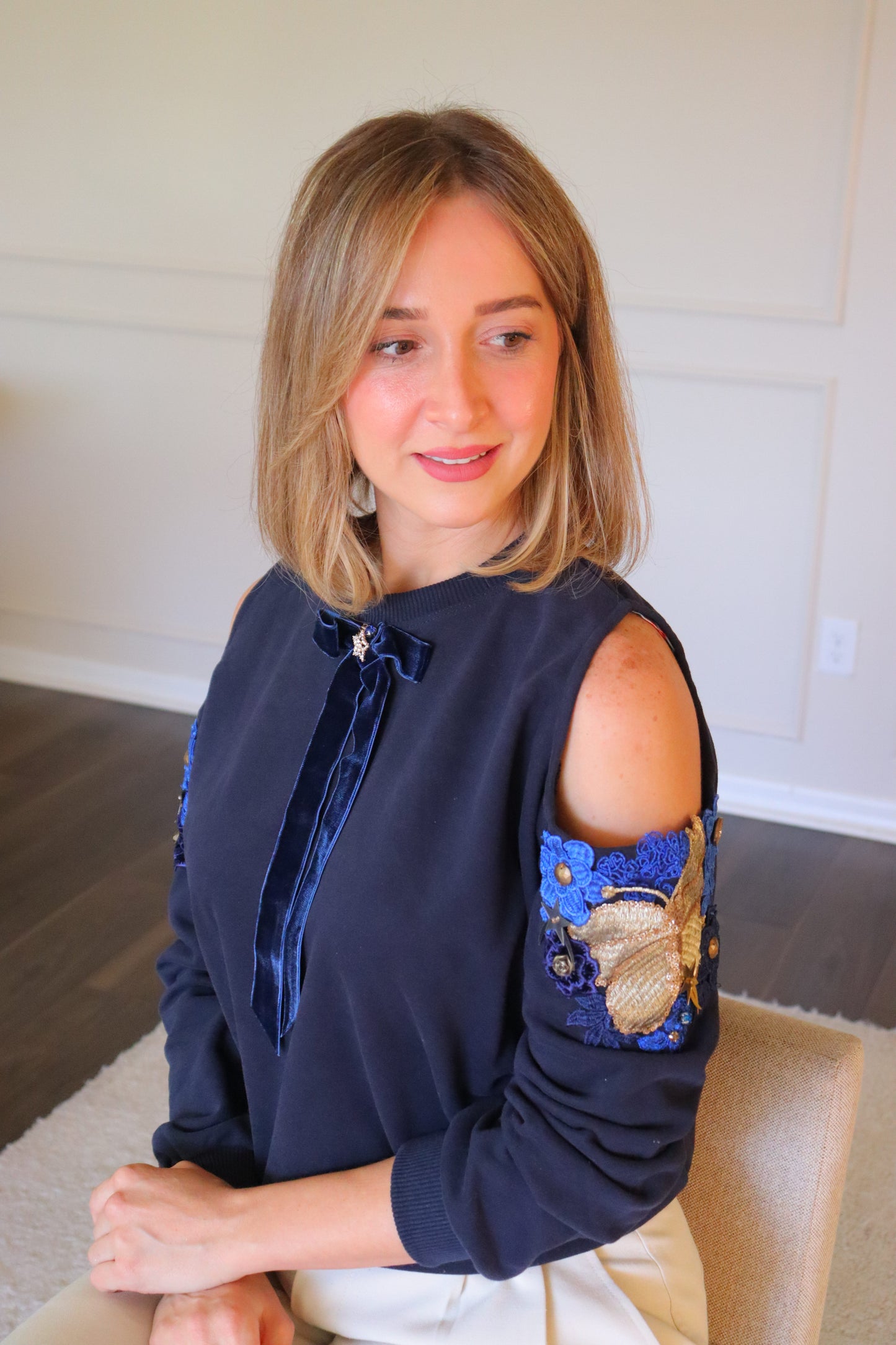 Cold shoulder flower embellished sweater- Velvet Bow