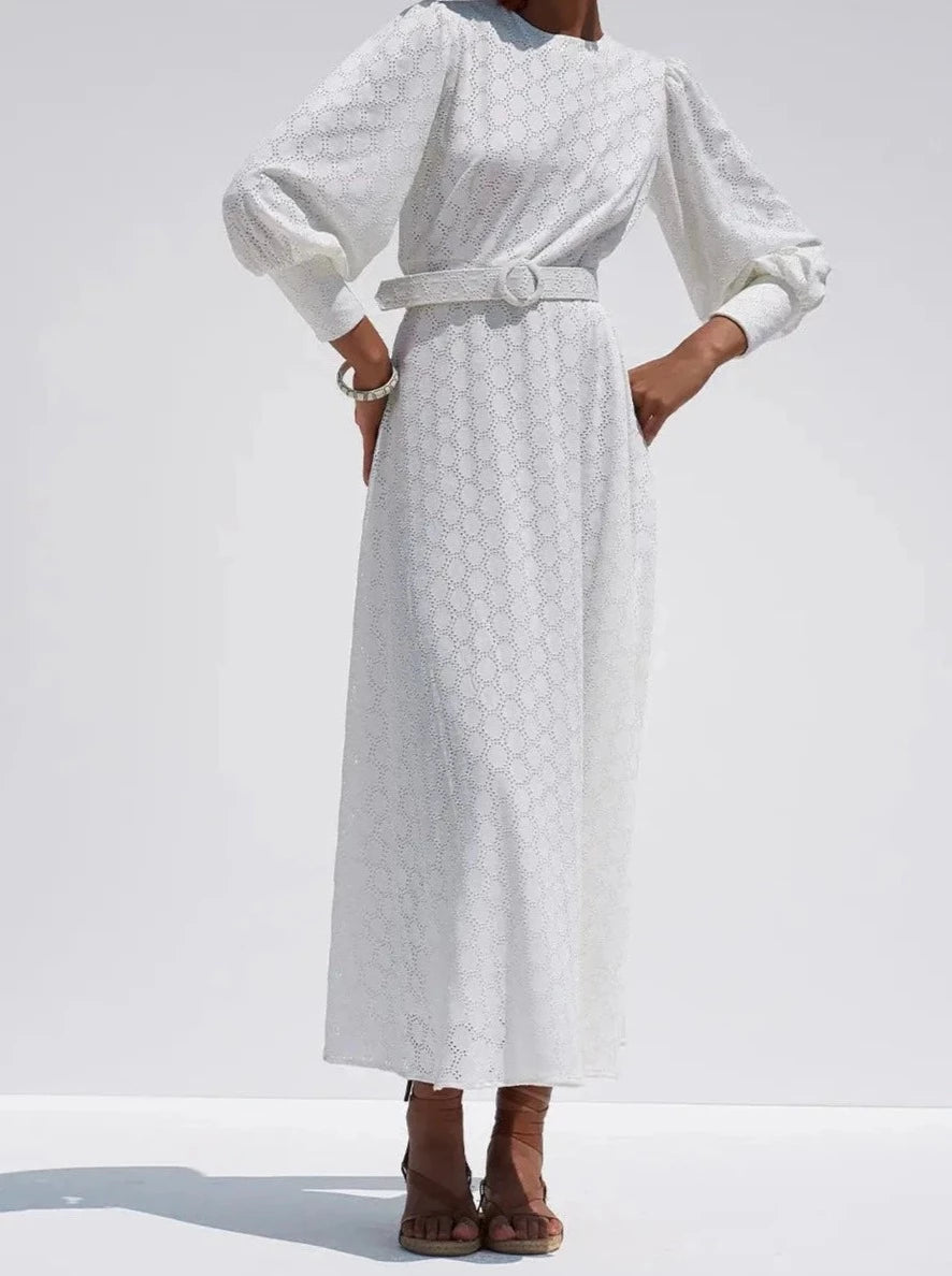 Feminine styling with the Oslo white patterns Dress!  - Cuff with zipper - Belt included - Puff Sleeve and a swingy pleated skirt - Material : Cotton/ Flat cut